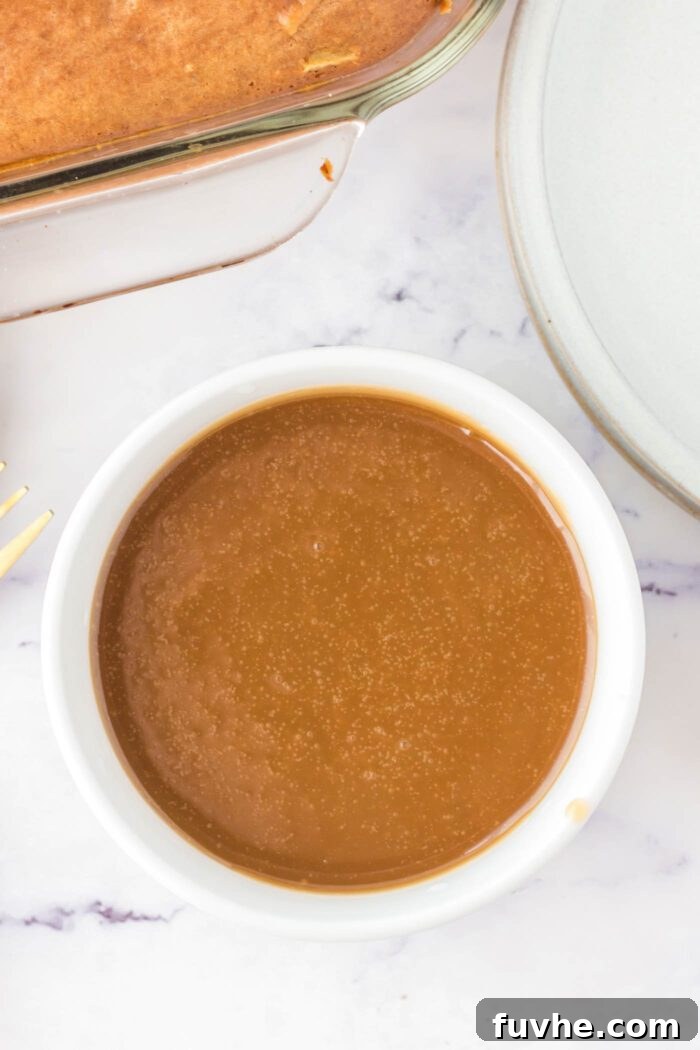 A brown sugar and coconut caramel glaze in a small white bowl.