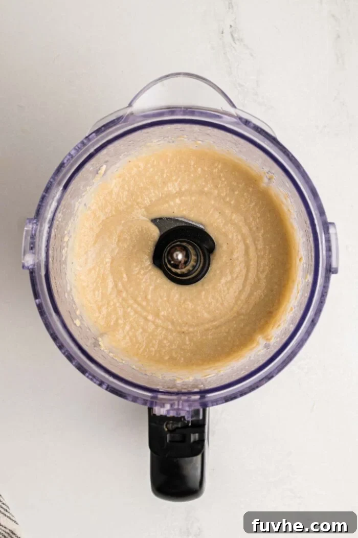 Decadent Vegan Tiramisu 12 Cashews blended into a creamy but slightly grainy mixture in a food processor.