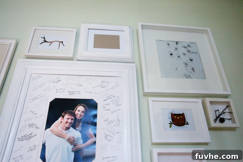Final view of the transformed stairway gallery wall, a successful home decor project