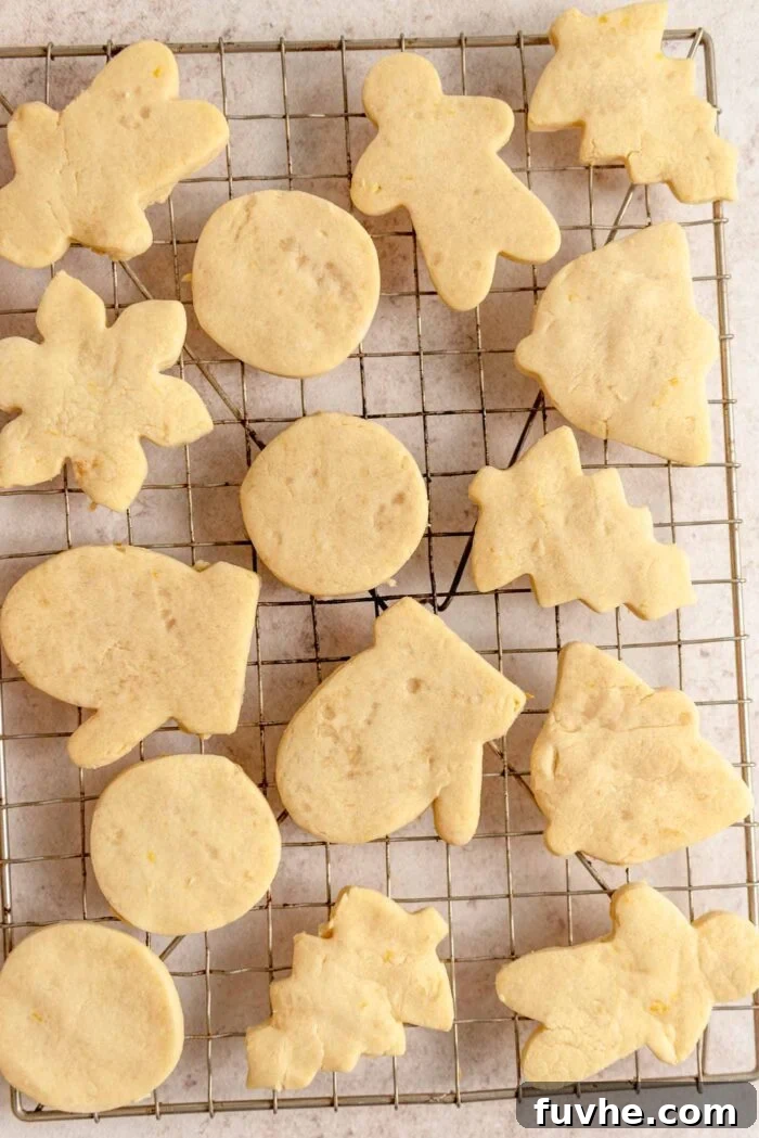 Zesty Lemon Shortbread Bites 8 Baked lemon shortbread cookies in the shapes of men, trees, starts and bells.