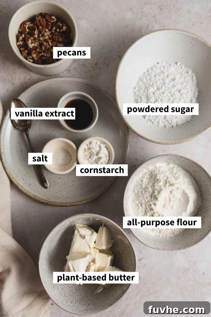 Melt-in-Your-Mouth Vegan Pecan Snowballs 3 All the ingredients needed for making a pecan snowball cookie recipe. Each ingredient is labelled with text overlay.