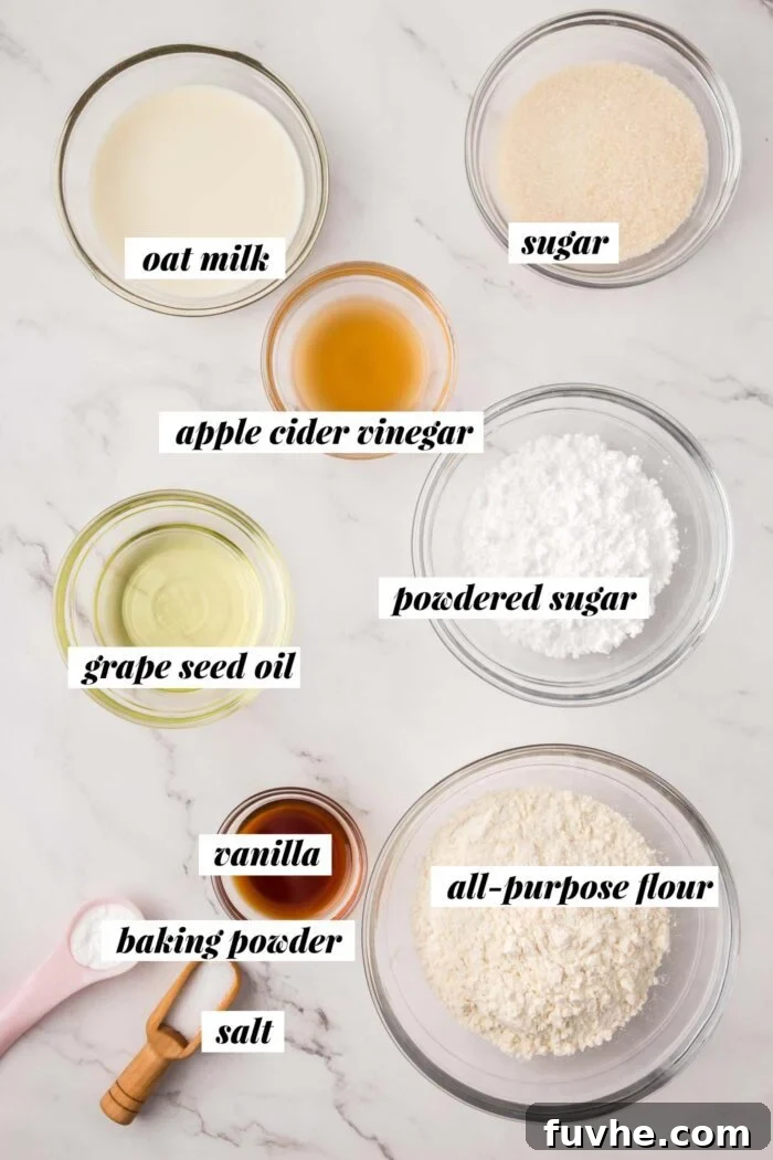All the ingredients needed for making vegan baked glazed donuts. Each ingredient is labelled with text overlay.