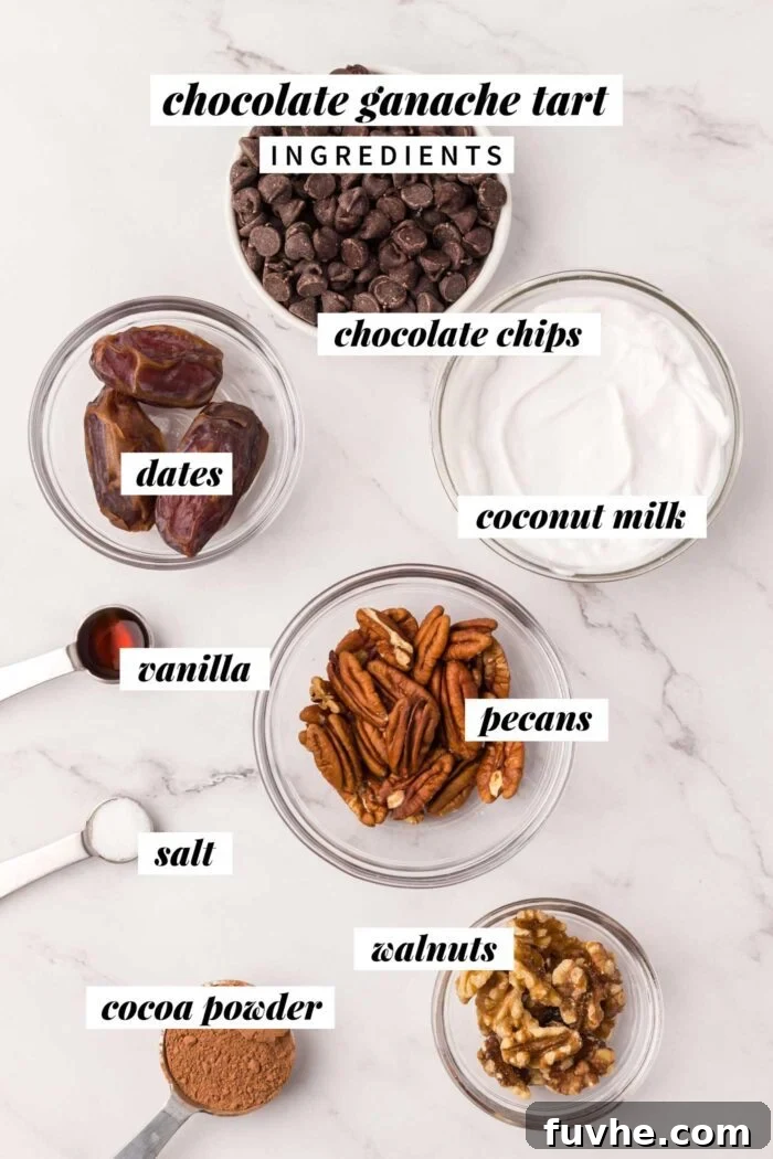 All the ingredients needed for a vegan no-bake chocolate tart recipe. Each ingredient is labelled with text.