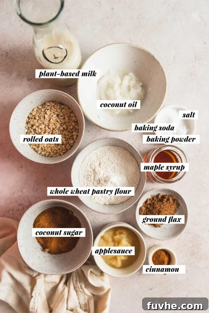 All the ingredients needed for a healthy vegan oatmeal muffins recipe. Each ingredient is labelled with text overlay and the list can be found on the corresponding blog page.