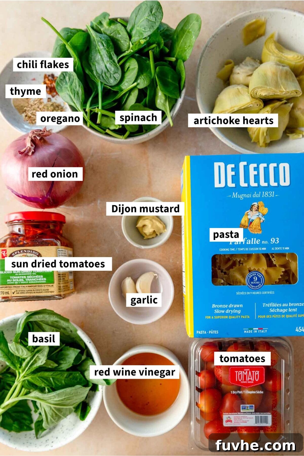 Tuscan Sun-Dried Tomato Pasta Salad 3 Ingredients for making vegan sun dried tomato pasta salad with red onion, basil, artichokes and tomatoes.