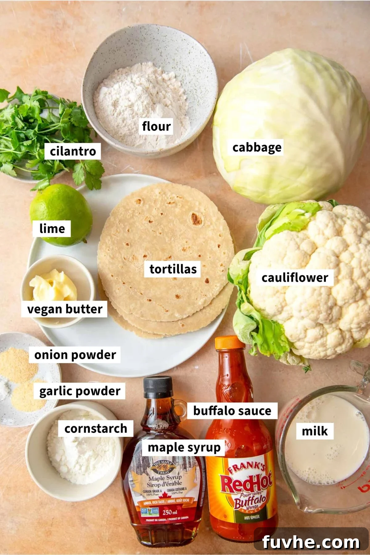Crispy Buffalo Cauliflower Tacos 3 All of the ingredients neatly arranged for making a vegan buffalo cauliflower taco recipe.