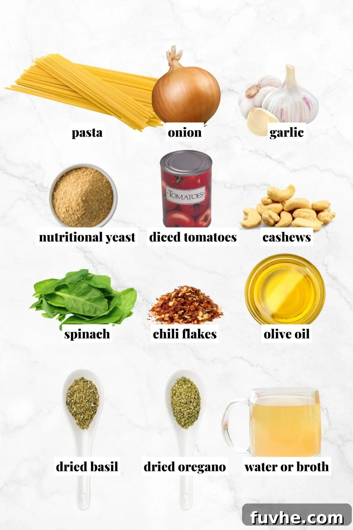 All the ingredients needed for making a vegan creamy pasta dish with canned tomatoes, cashews, spinach, herbs, onion and garlic.
