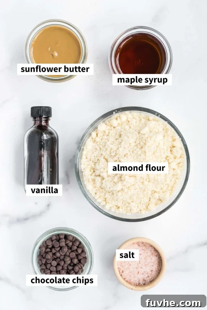 A flat lay of the six simple ingredients required to make this healthy edible almond flour cookie dough.