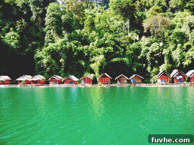 Simple floating huts on Chiew Lan Lake, offering a unique stay