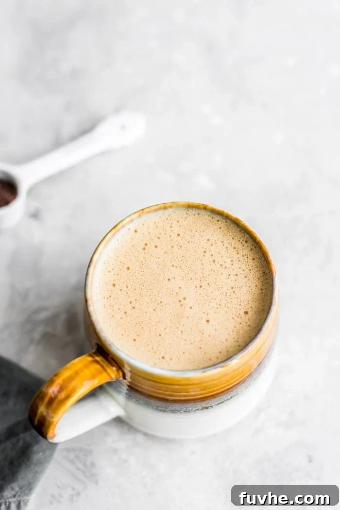 Vegan bulletproof coffee in a mug.