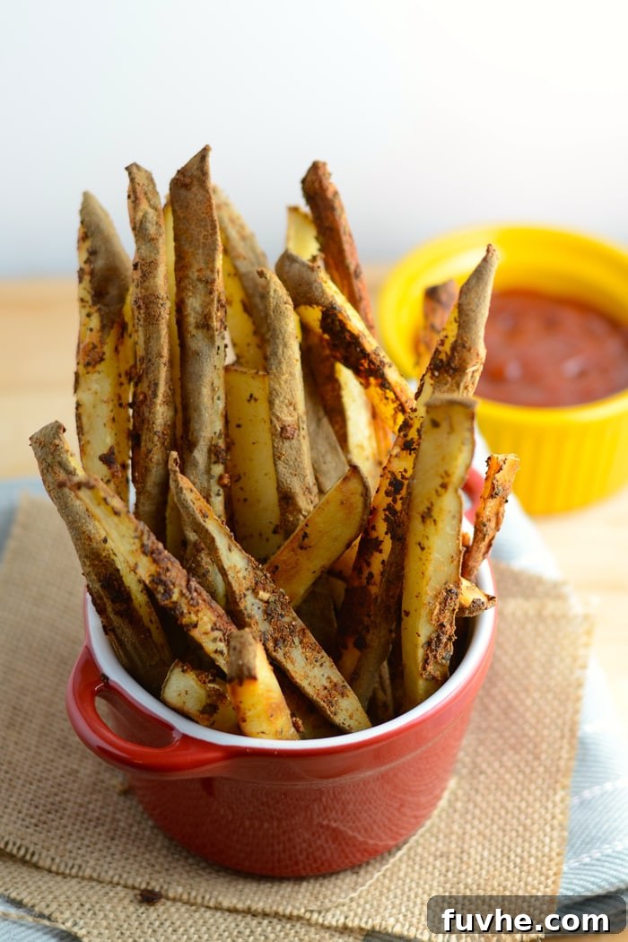 Crispy fat-free baked fries made from sweet potato, a macro-friendly and delicious plant-based snack.