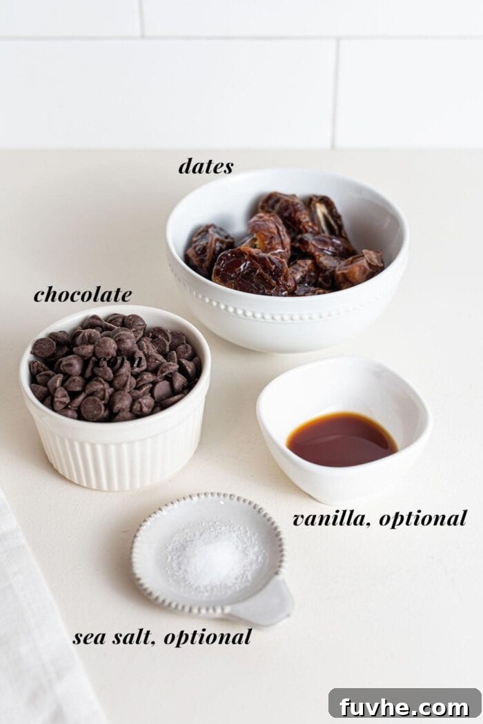 Bowls of chocolate chips, dates, vanilla extract, and sea salt, ready to be transformed into delicious vegan chocolate caramel cups.