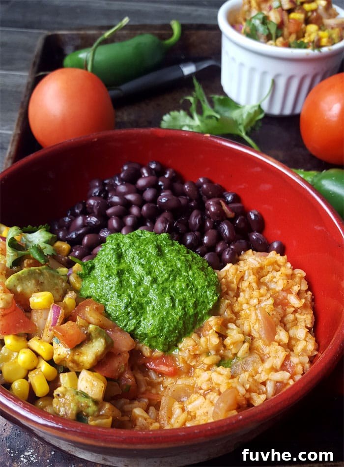 Plant-Powered Burrito Bowls 3 Close-up of black bean chimichurri burrito bowls, highlighting fresh ingredients
