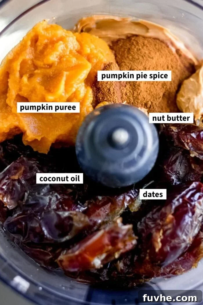 Dates, pumpkin, pumpkin pie spice and peanut butter in a food processor.