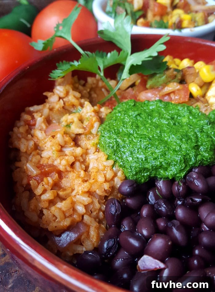 Vegan Burrito Bowls with Chimmichurri Sauce and Avocado Corn Salsa