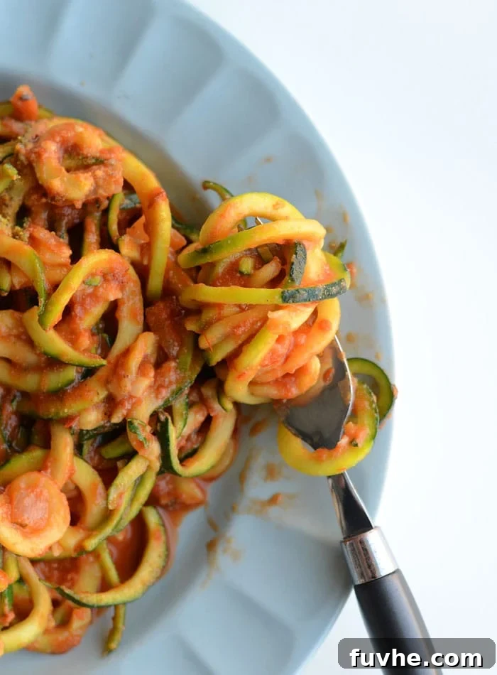 Mastering Macros: 23 Vegan Meals and Snacks 3 Spicy marinara zoodles with nutritional yeast, a high-volume, low-macro vegan meal for flexible dieting.
