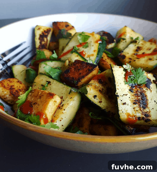 Mastering Macros: 23 Vegan Meals and Snacks 10 Sautéed garlic zucchini and tofu with cilantro, a high-protein, low-macro vegan meal.