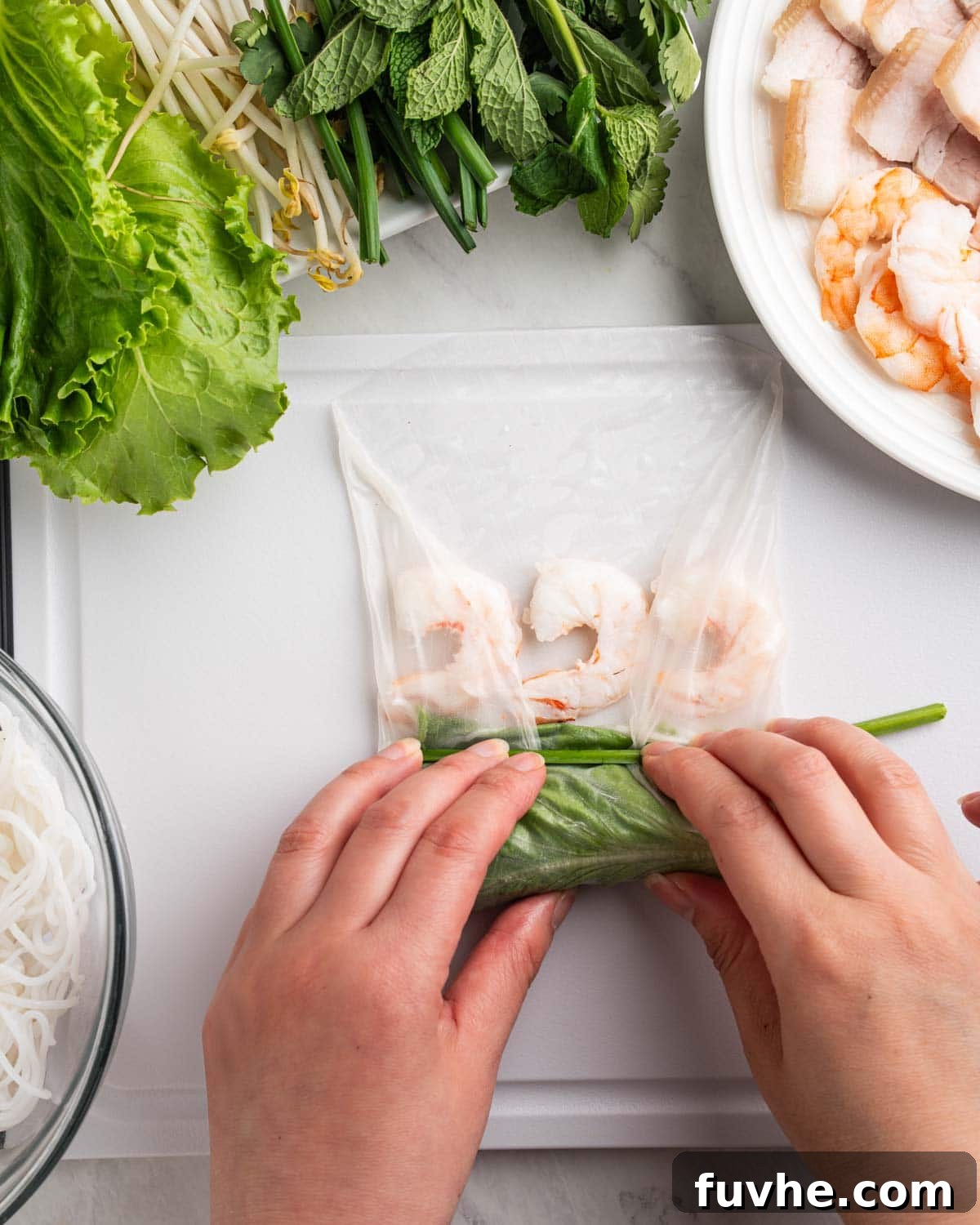 Vietnamese Fresh Spring Rolls (Gỏi Cuốn) — Authentic Recipe 13 hands wrapping spring roll.