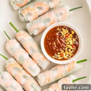 Vietnamese Fresh Spring Rolls (Gỏi Cuốn) — Authentic Recipe 19 Vietnamese spring rolls goi cuon on a plate.