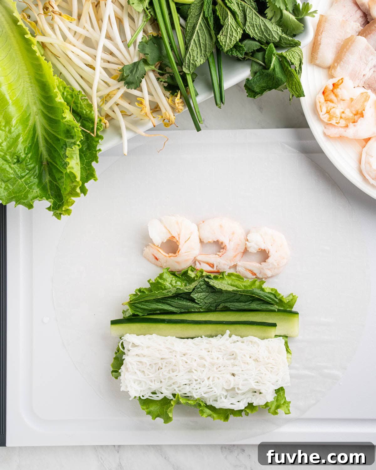 Vietnamese Fresh Spring Rolls (Gỏi Cuốn) — Authentic Recipe 9 ingredients placed on rice paper.